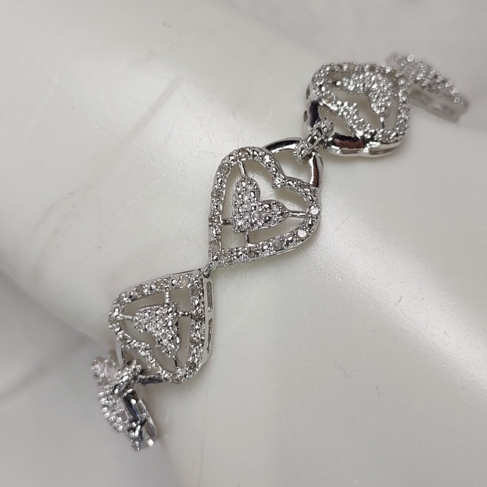 Sterling Silver Linked Hearts Bracelet